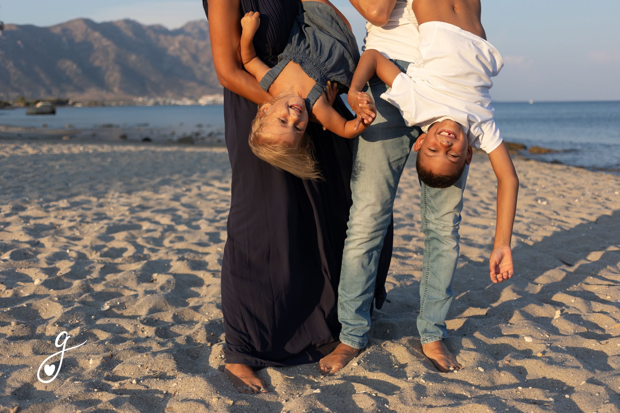 Servizio fotografico famiglia in spiaggia